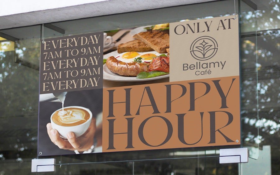 Vinyl banner with café promotion displayed outdoors